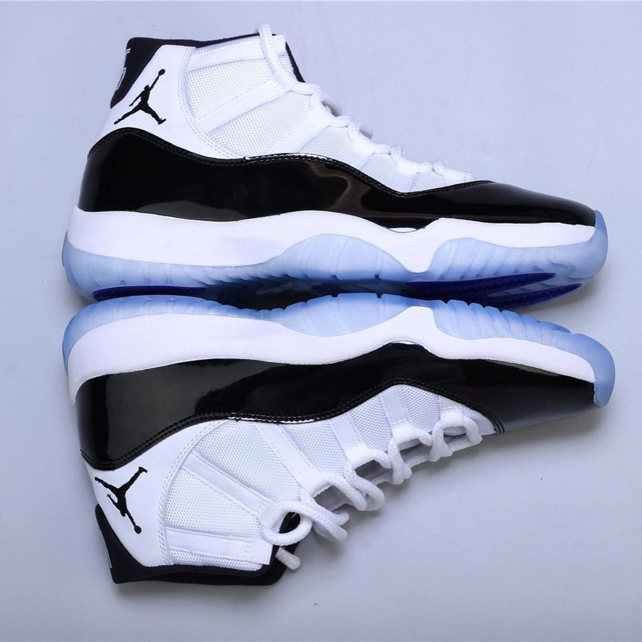 air-jordan-11-xi-concord-2018-release-date-378037-100-side-by-side.jpg